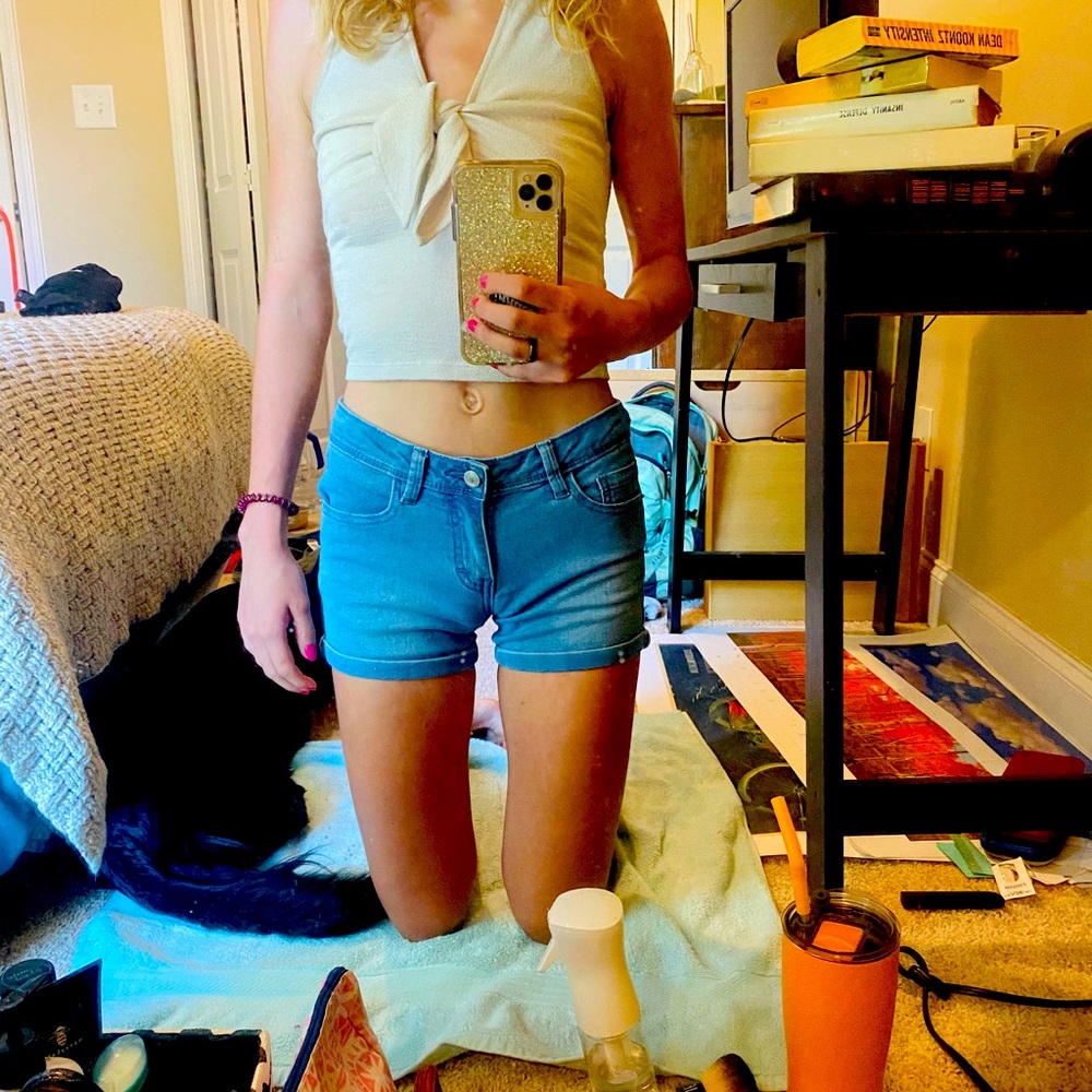 Ponytails blue shorts.